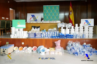 A photo of impounded items from the bust.